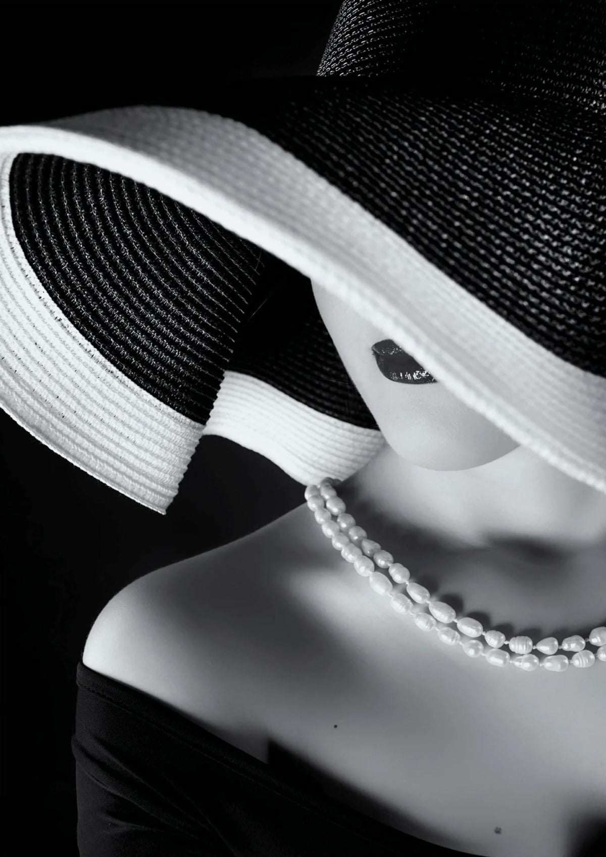 LA FEMME AU CHAPEAU