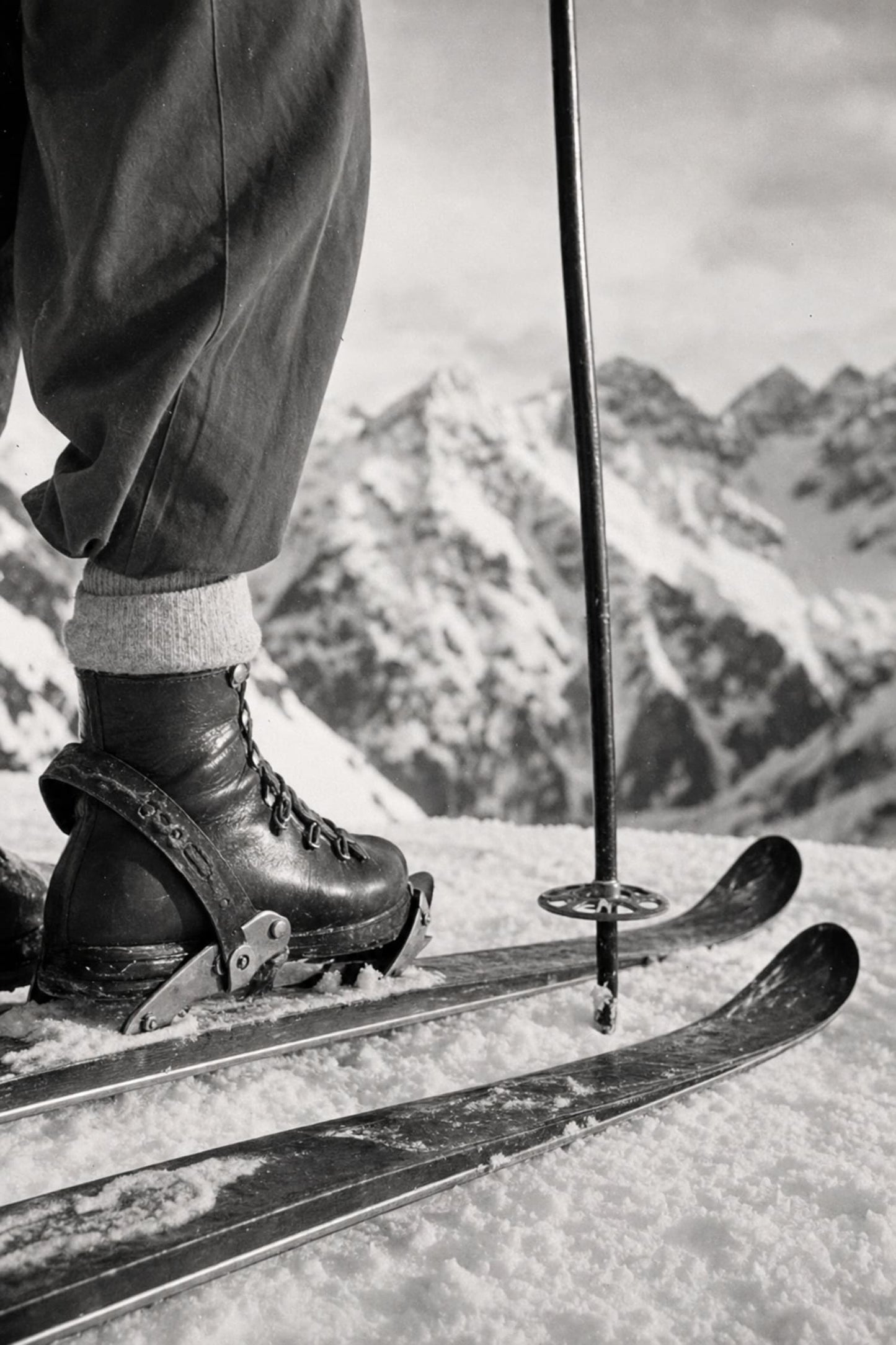 Vintage Ski Boots and Skis on Snowy Mountain | Retro Winter Sports Wall Art | Black and White Photography Print Poster