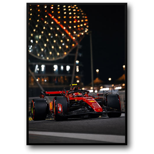 FERRARI: RED RACE CAR AT NIGHT